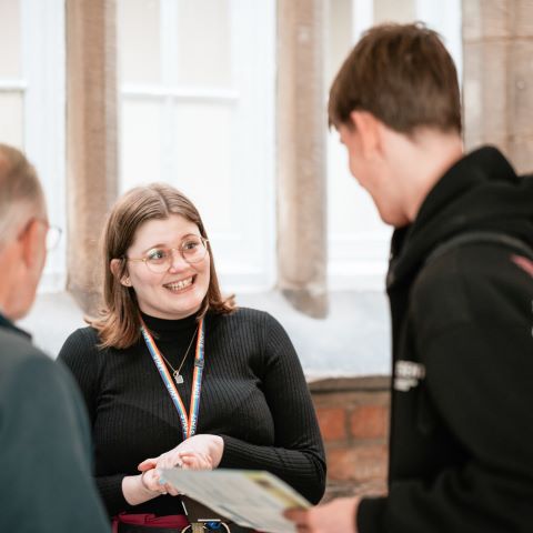 Students and adviser at a Discovery event
