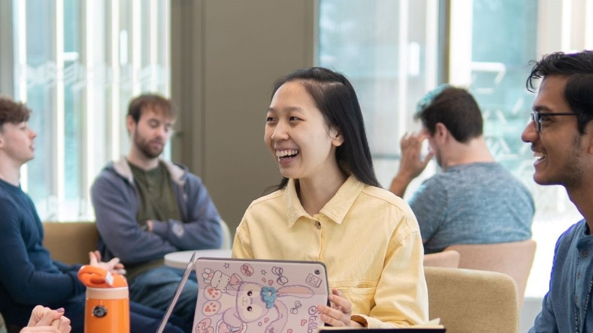 Students chatting in communal area at university
