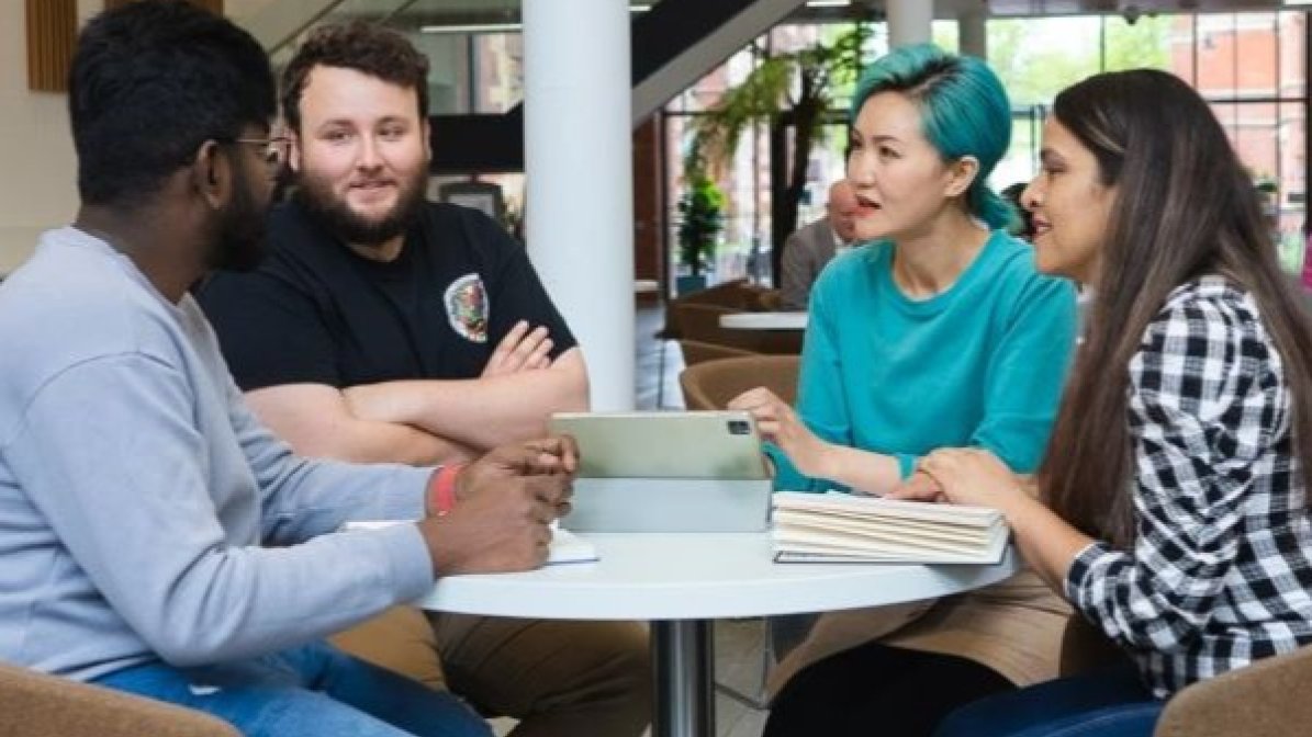 Students chatting in communal area at university