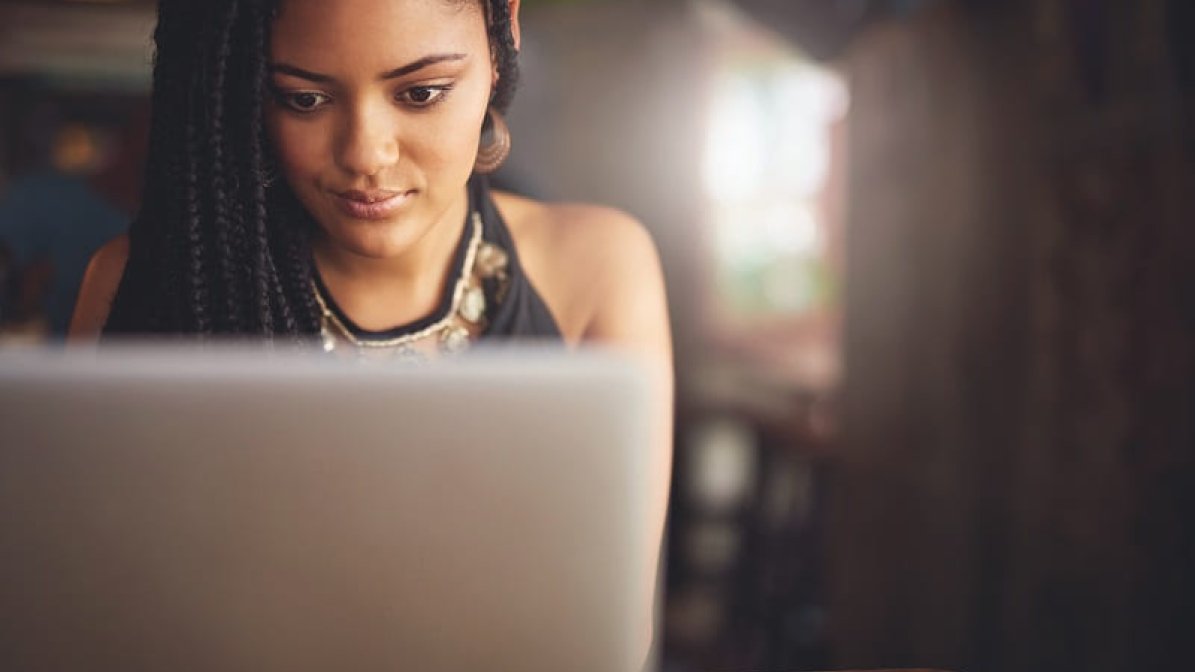 Student looking at laptop