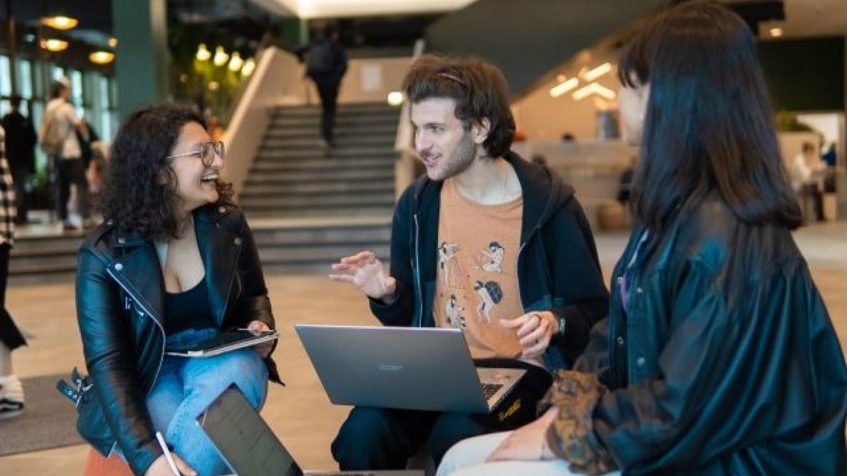 Students studying together in communal area at unviersity 