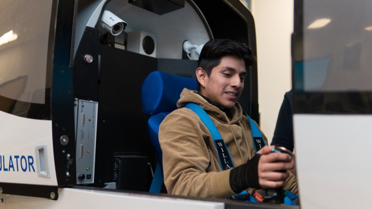 Aerospace engineering apprentice in simulator