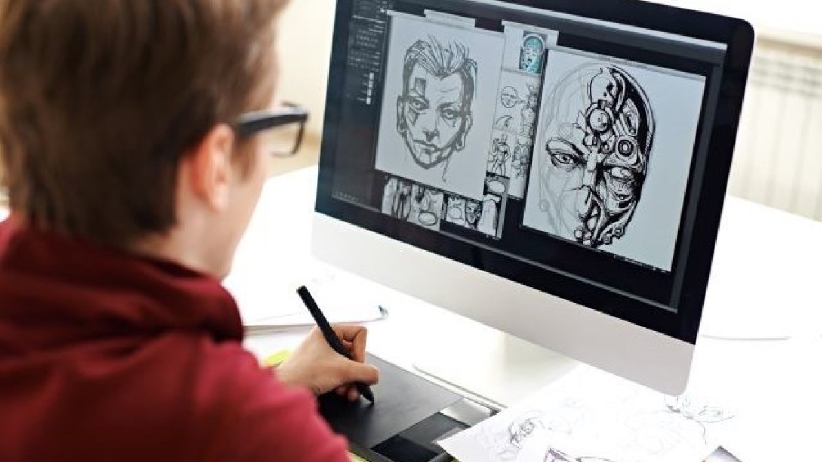 Digital artist using laptop 