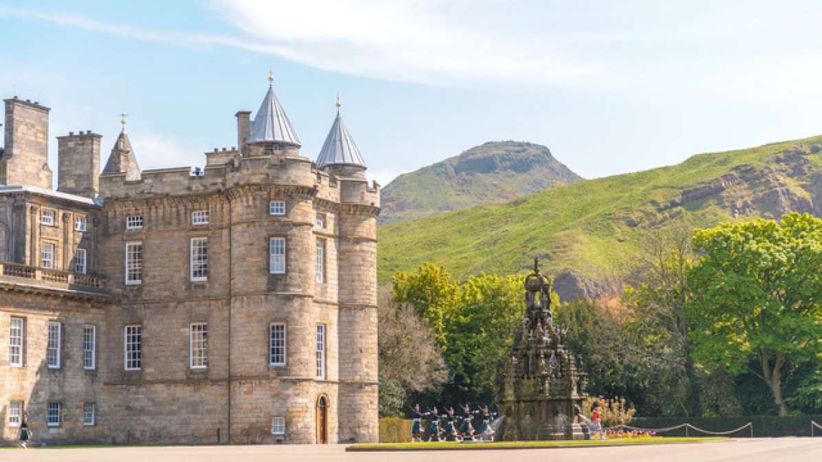 Historic building in front of hill