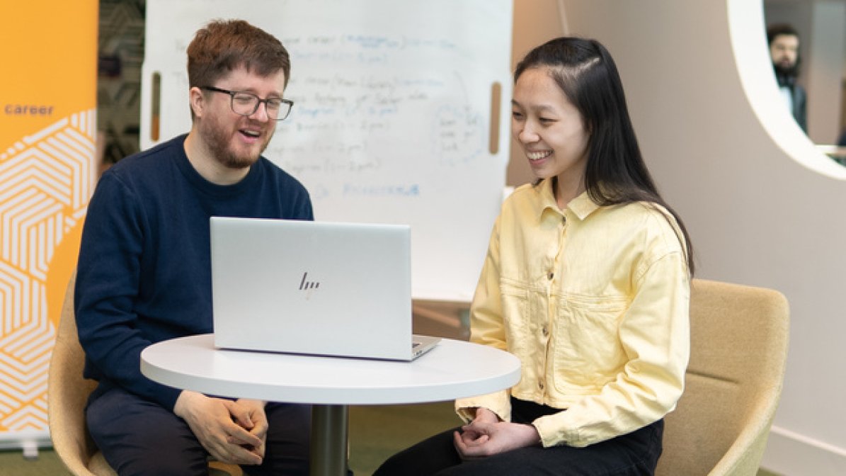 International adviser chatting to student