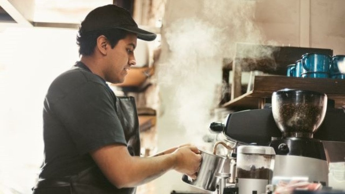 Student working in coffee shop