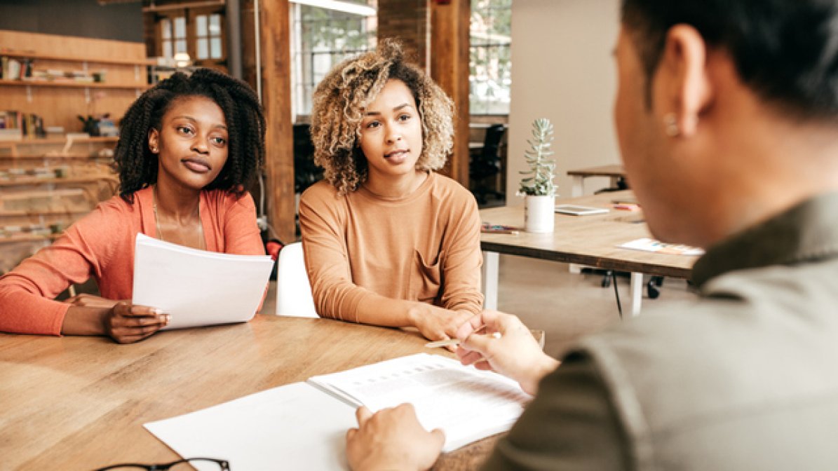 Two clients being given legal advice