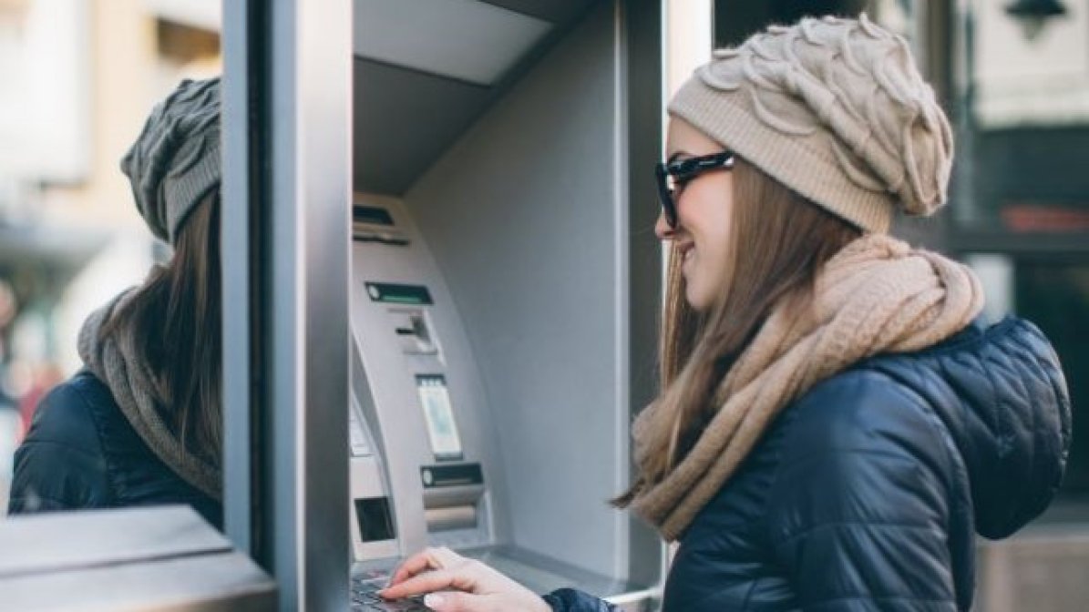 Student using an ATM