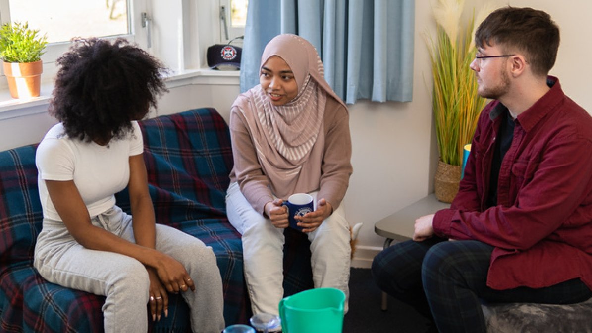 Students chatting in halls lounge