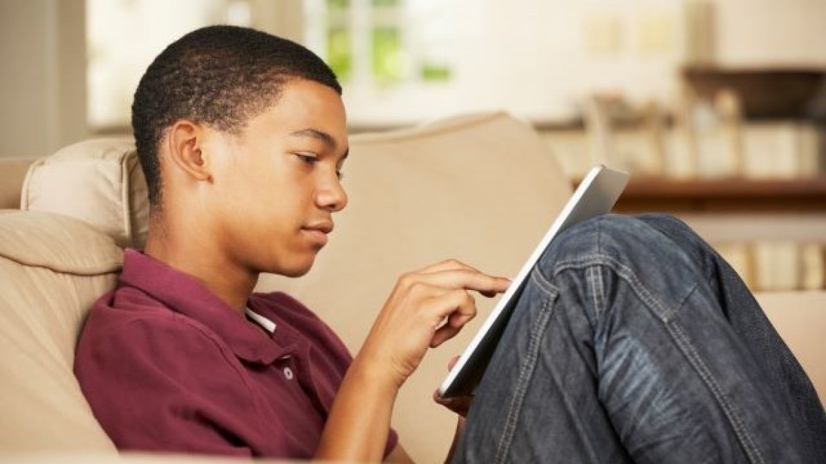 Student using laptop at home