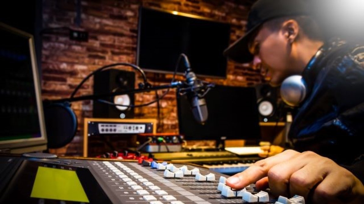 Sound engineer using digital equipment