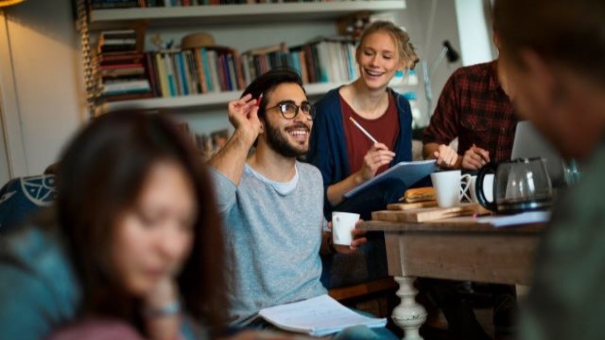 Food science students chatting in communal living area