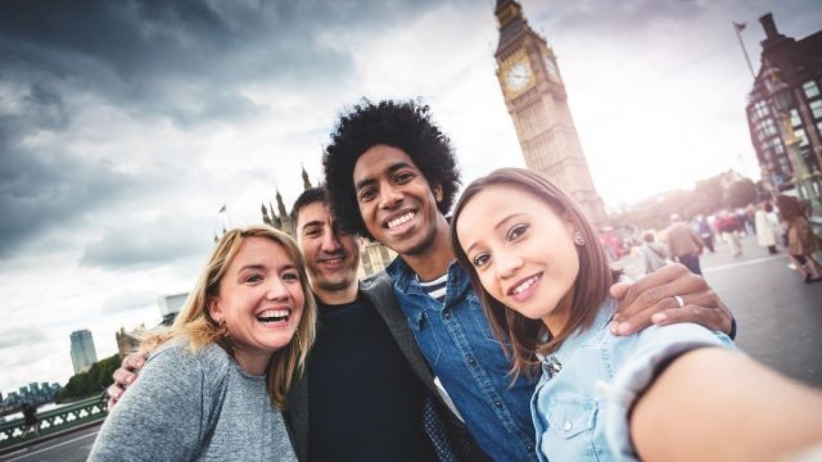 Hospitality, leisure and tourism students talking a selfie in London