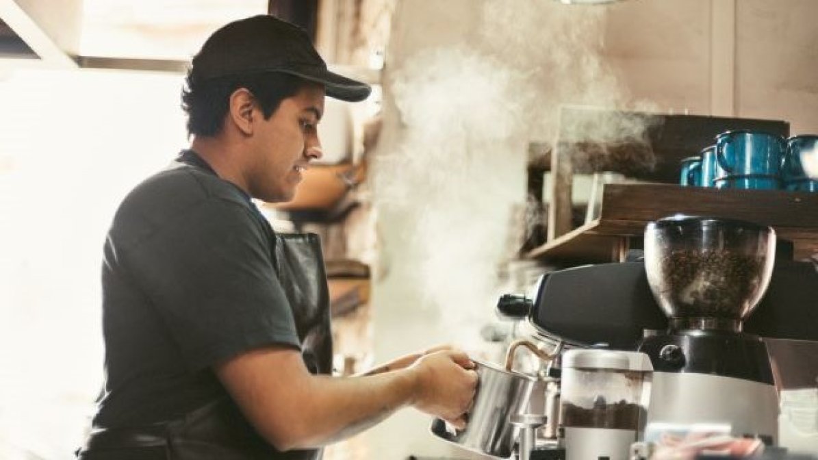 Barista making coffee