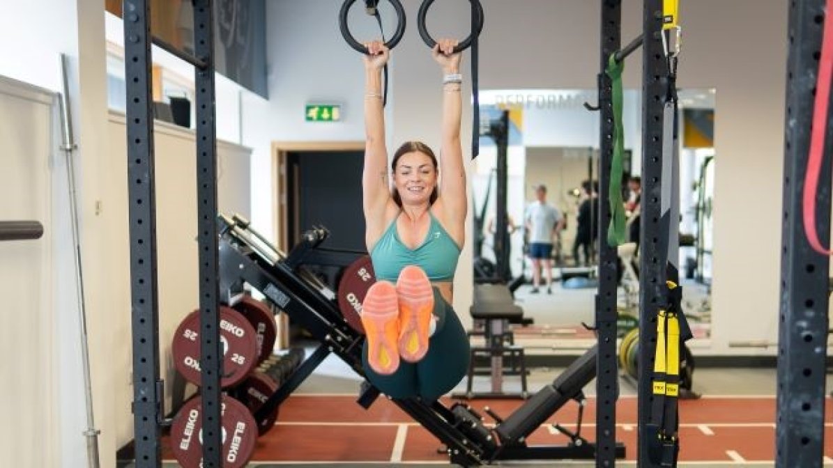 Student working out in a gym