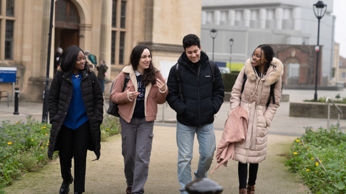 Students walking outside on campus
