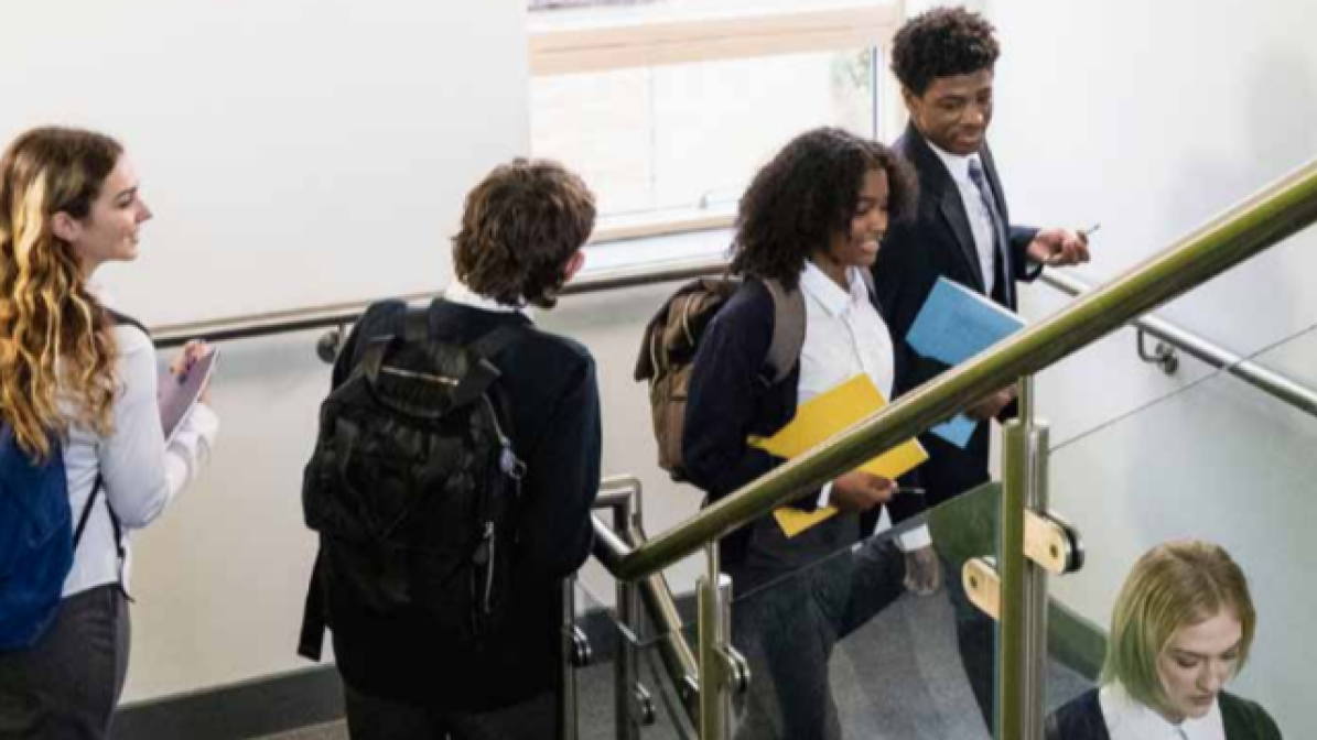 School students in stairwell