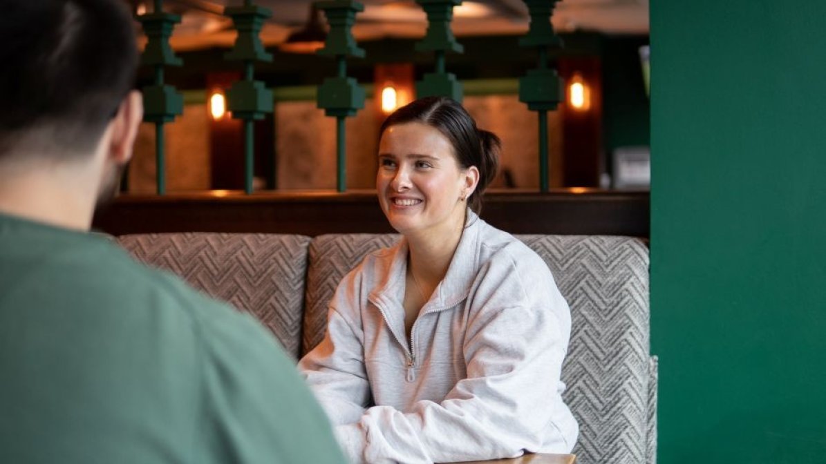 Adviser talking to student 