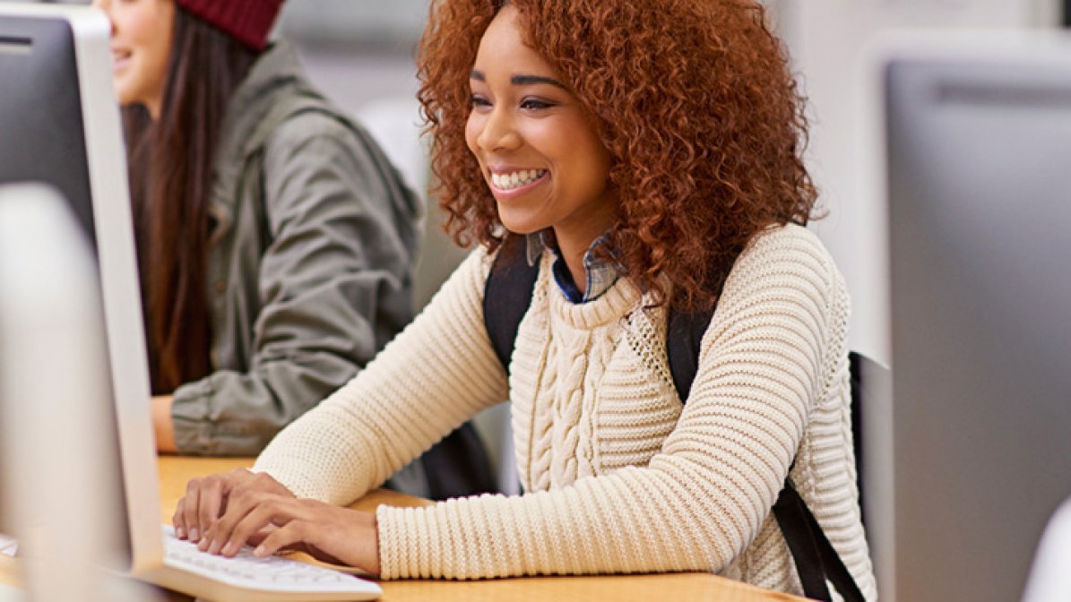 Smiling student in class