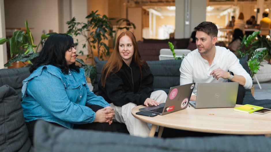 Apprentices in meeting in workplace