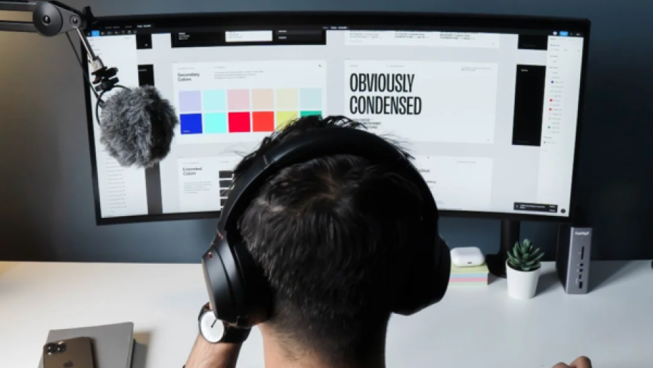 Graphic designer working on two screens