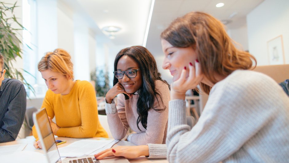 Apprentices in a meeting