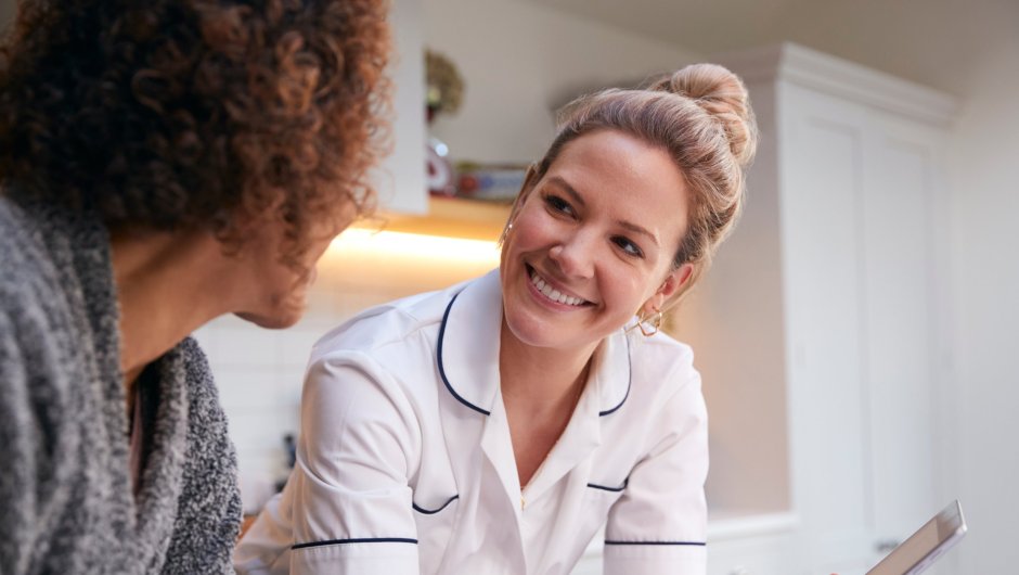 Public health worker and client