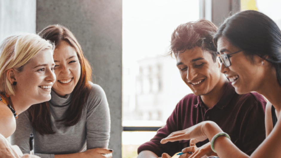 Apprentices chatting in meeting