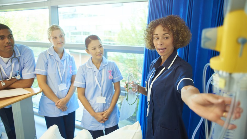 Trainee nurses on hospital ward