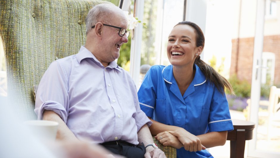 Apprentice nurse with patient