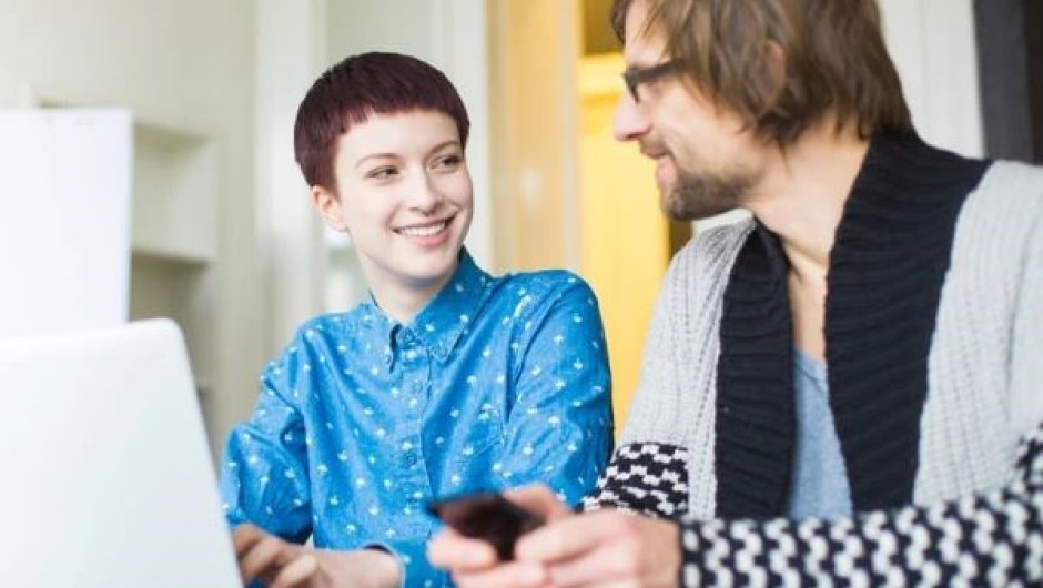 Parent and student using laptop
