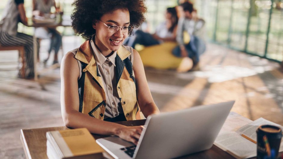 A woman working on a laptop