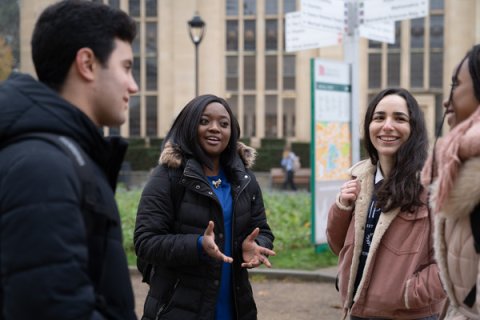 International students chatting on campus 