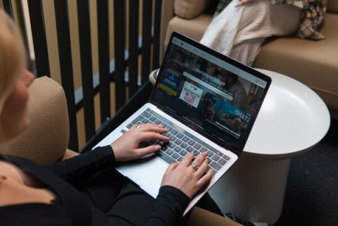 Student using laptop to write personal statement