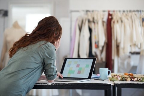 Designer working on laptop