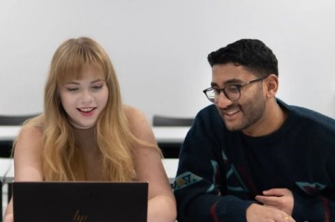 Students working on laptop