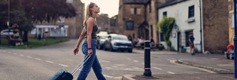Woman crossing the road