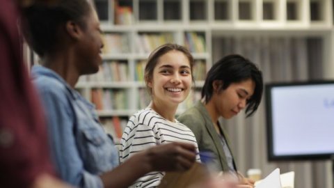 International students in a school library