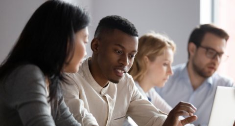 International students students using laptop