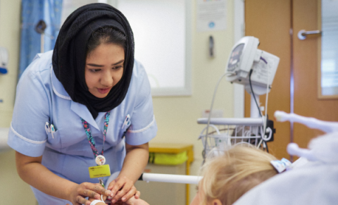 nurse looking after a patient